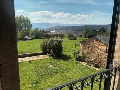 a view of a green field from a balcony at Palacio de Cantiz 