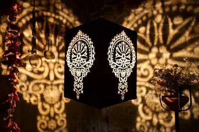 a black umbrella with white embroidery on a wall at Casa do Pacio Sabadelle in Lugo