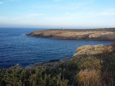 an island in the middle of the ocean at Casiña de Folgosa in Ribadeo