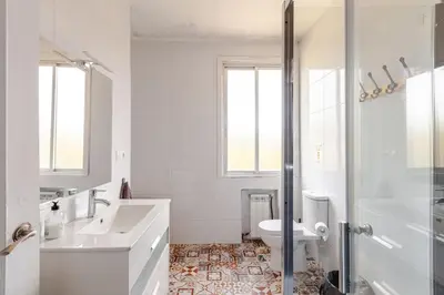 a bathroom with a sink and a toilet and a shower at Casa Mosteiro in Bribes