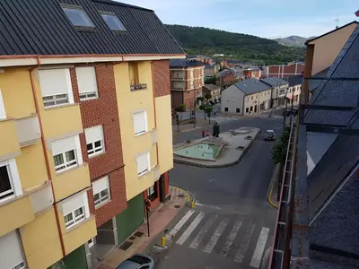 an aerial view of a city street with buildings at HOSTAL CAMELOT in Fabero