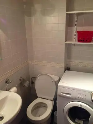 a small bathroom with a toilet and a sink at M Ramona Reja Díaz in Lourenzá