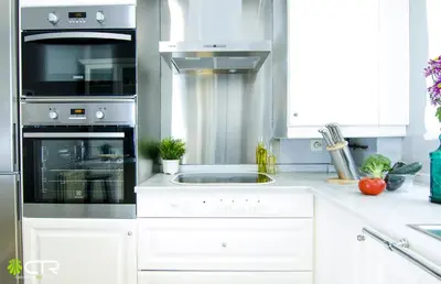 a kitchen with a sink and a stove top oven at CON PARKING, LocalizacIon Sensacional in Santiago de Compostela