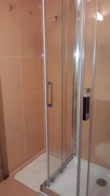 a shower with a glass door in a bathroom at Panoramico Playa de Altar II in Barreiros
