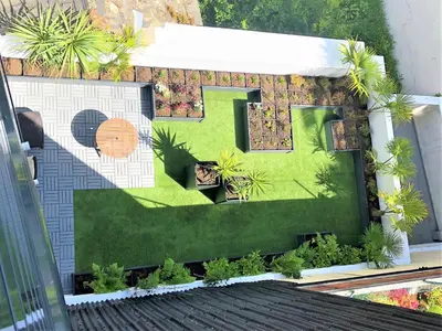 an aerial view of a garden on a building at 4 Apartamentos de Autor in Lugo