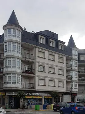 a large white building with a pointed roof at Miranda VUT-PO-004637 in Caldas de Reis