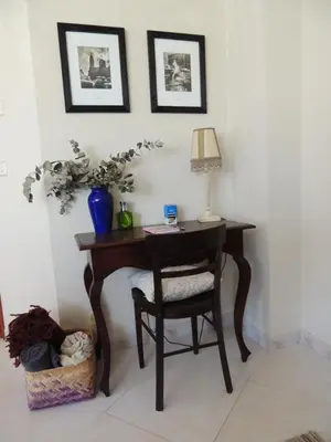 a desk with a chair and a lamp on it at Miranda VUT-PO-004637 in Caldas de Reis