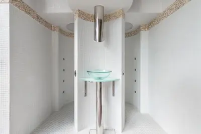a room with a blue table in the corner at Áurea Palacio de Sober by Eurostars Hotel Company in Sober