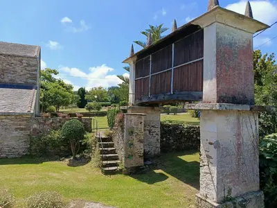 an external view of a house with a balcony at Casa Valle in Foz