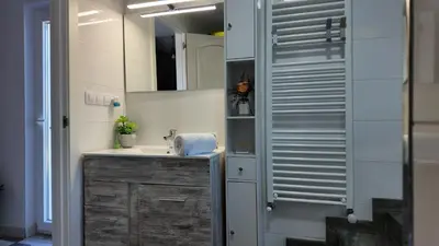 a bathroom with a sink and a mirror at PANTON RURAL Casa Do José in Pantón