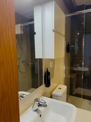 a bathroom with a sink and a toilet at PR Campanas de San Juan in Santiago de Compostela