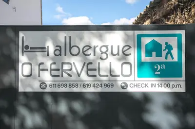 a sign that reads albariouce de reveille at Pensión Dorotea in Lavacolla