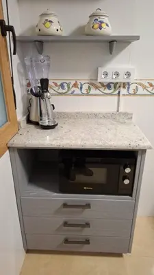 a kitchen counter with a blender on top of it at nice apartment Don Santiago in Santiago de Compostela