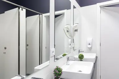 a bathroom with two sinks and a mirror at Dream in Santiago in Santiago de Compostela
