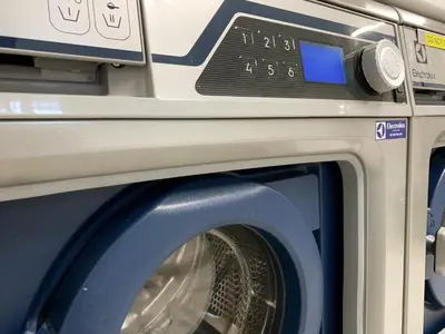 a washer and dryer sitting next to each other at Dream in Santiago in Santiago de Compostela