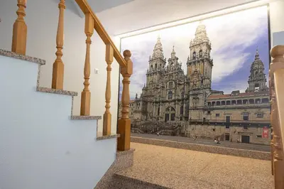 a view of a cathedral from a balcony at Hostal O'Cruceiro in O Pino