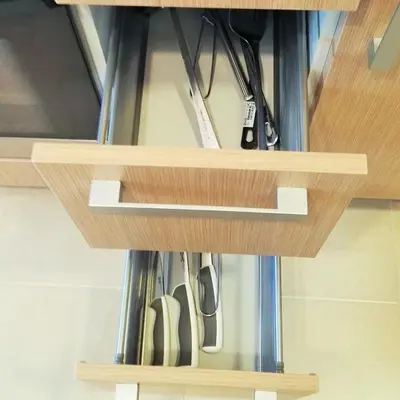 a wooden shelf with a bunch of shoes at Apartagal-San Miguel Barreiros in Barreiros