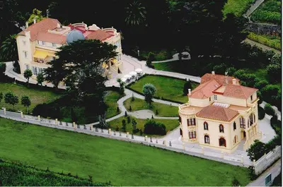 a model of a house with a large house at Hotel Palacete Peñalba in Castropol