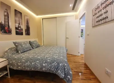 a bedroom with a bed in a room at Burgas Termal in Ourense