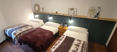 a hotel room with two beds at Hostal Cruce in Villafranca del Bierzo