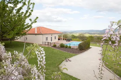 a house with a swimming pool in a yard at Casa Borlas in Vilamelle