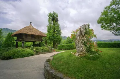 a gazebo in a garden with a grass at Casa Bouza in Becerreá