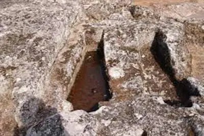 a hole in a rock with a hole in it at O Tipico in Ribadavia