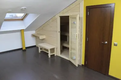 a room with a staircase with a closet and a door at Hostal Nirvana in Ponferrada
