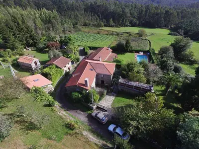 an aerial view of a house with a swimming pool at Casa Labazá in Villarmayor