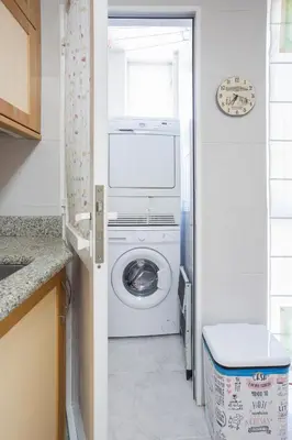 a laundry room with a washer and dryer at JacobeAndo in Sarria
