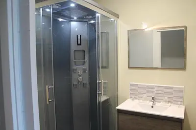 a bathroom with a shower and a sink at Casa Costoya in Arzúa