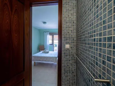 a bathroom with a room with aificialificialificialificialificialificialificialificialificial at Apartment Edificio Bahia II by Interhome in Miño