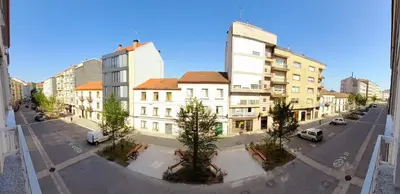 a view of a city street with buildings and cars at Buen camino in Santiago de Compostela
