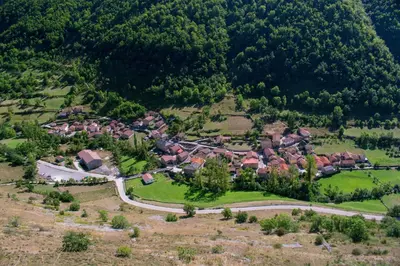 an aerial view of a small village in a mountain at Casa Serafo in Saliencia