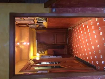 an empty room with a staircase in a building at Hotel Nueva Allandesa in Pola de Allande