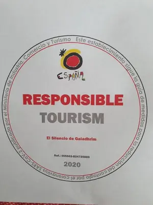 a sign with the wordsresistible tourism on it at Cozy Apartment Ponferrada 109 m², Parking in Ponferrada