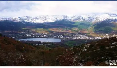 a view of a valley with snow covered mountains at Casa Penelas in Petín