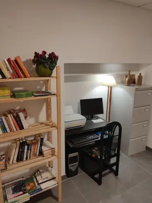 a room with a desk with a computer on it at Hotel Chef Rivera in Padrón