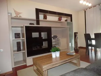 a living room with a large flat screen tv at PISO ACOGEDOR EN SADA COZY FLAT IN SADA WiFi in Sada