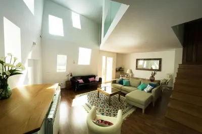 a living room with a couch and a table at La Postoca in Viavélez