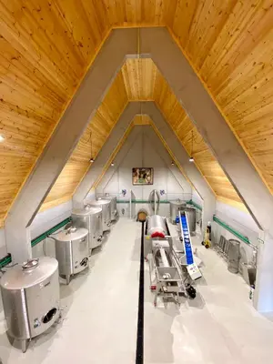 an attic room with a group of sinks at Cabañas Enoturismo María Manuela in Pousada