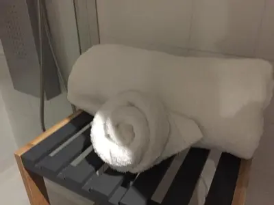 a roll of paper towels sitting on a shelf at ÁGORA LUX in Ourense