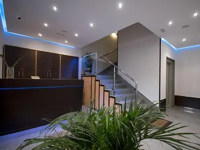 a staircase in a room with a stair case at Albergue Piñeiral Fonsagrada in Fonsagrada