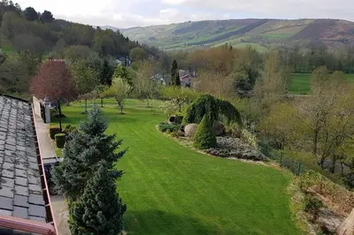 an aerial view of a green yard with trees at POSTA Do SOL in Baralla