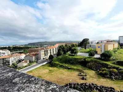 an aerial view of a city with buildings at Acogedor apartamento a la entrada de camino portugués in Santiago de Compostela