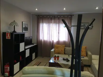 a living room with a couch and a table at Apartamentos Rurales San Xillao in Ribadeo