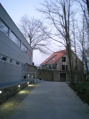 a walkway next to a building next to a building at PR Albeitaría in Reis