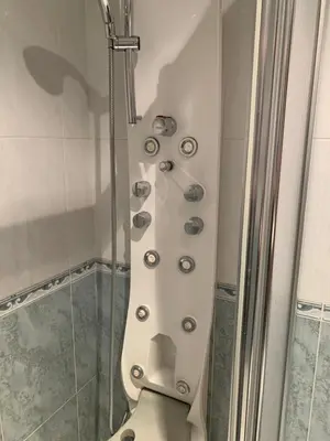 a bathroom with a shower with a toilet and a glass shower at Oktheway San Eufrasio in Sarria