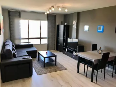 a living room with a couch and a table at lucushouse I in Lugo
