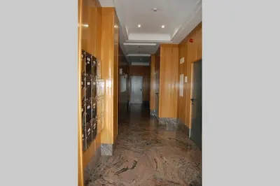 a hallway of a building with wooden walls and a hallwayngth at La Casa de Lines in Monforte de Lemos